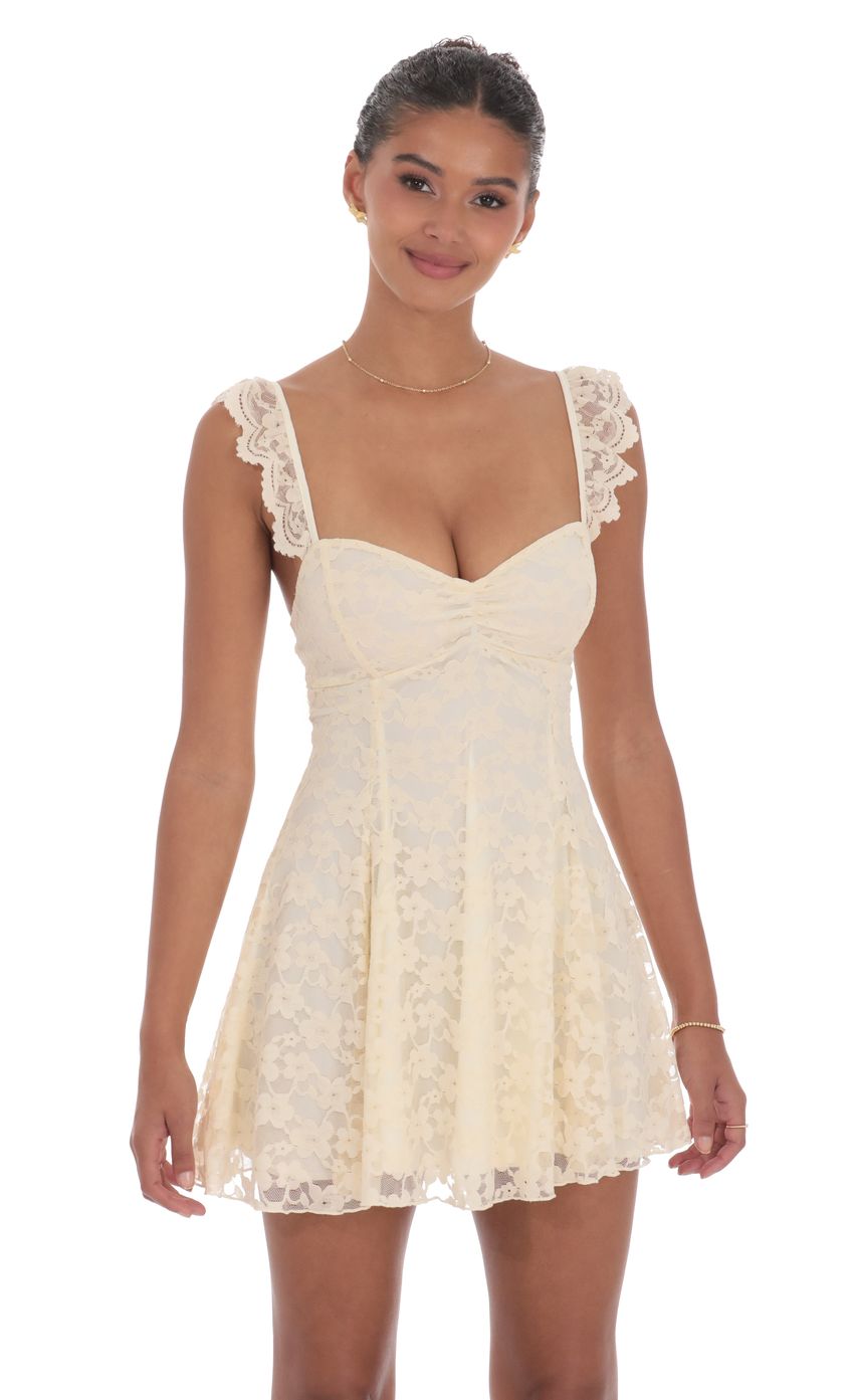 Picture Lace Fit and Flare Dress in Cream. Source: https://media-img.lucyinthesky.com/data/product-media/850xAUTO/adb12ce2-cf60-4924-8319-576a8e770243.jpg