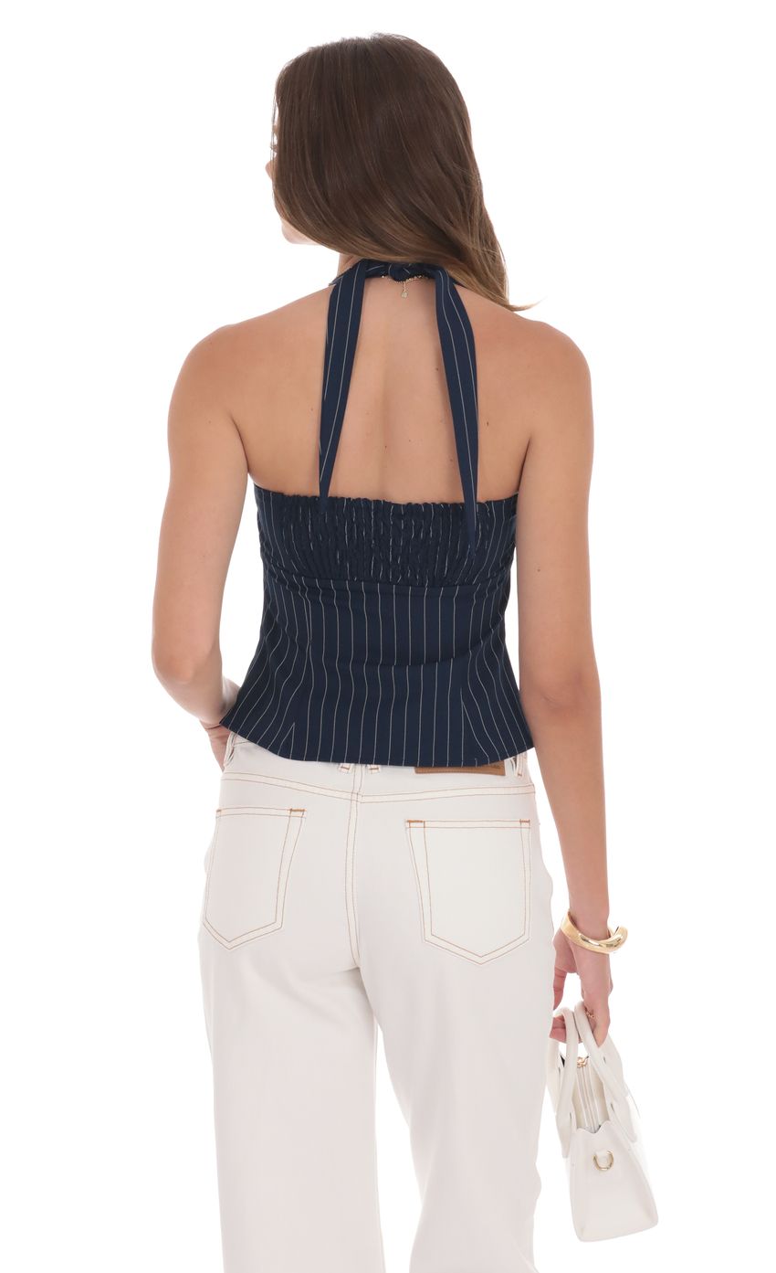 Picture Halter Pinstripe Top In Navy. Source: https://media-img.lucyinthesky.com/data/product-media/850xAUTO/ae31097d-dc5f-47ce-93fd-cc5a1c00fd6e.jpg