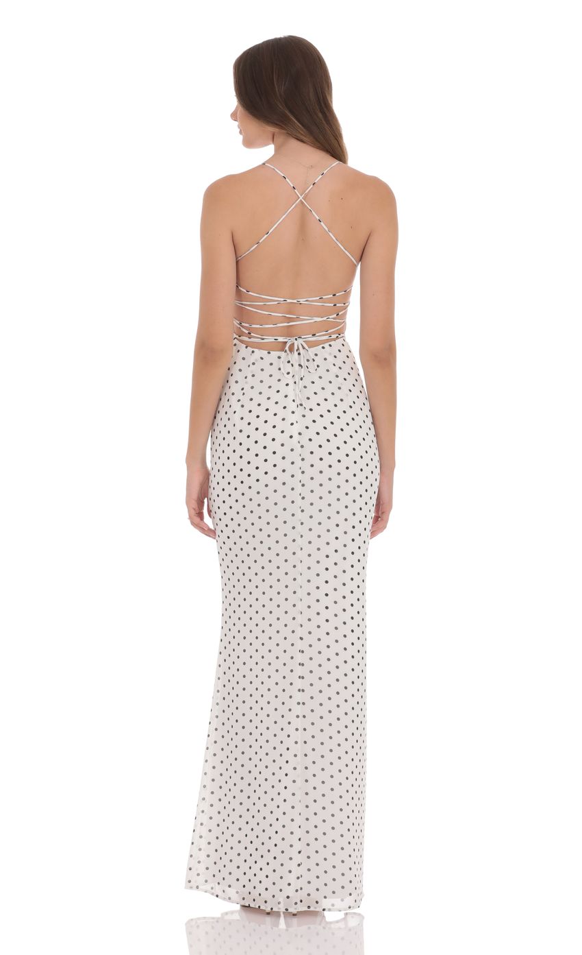 Picture Polka Dot Open Back Maxi Dress in White. Source: https://media-img.lucyinthesky.com/data/product-media/850xAUTO/ae45012d-7940-43c4-9a92-0b0ef4817f41.jpg