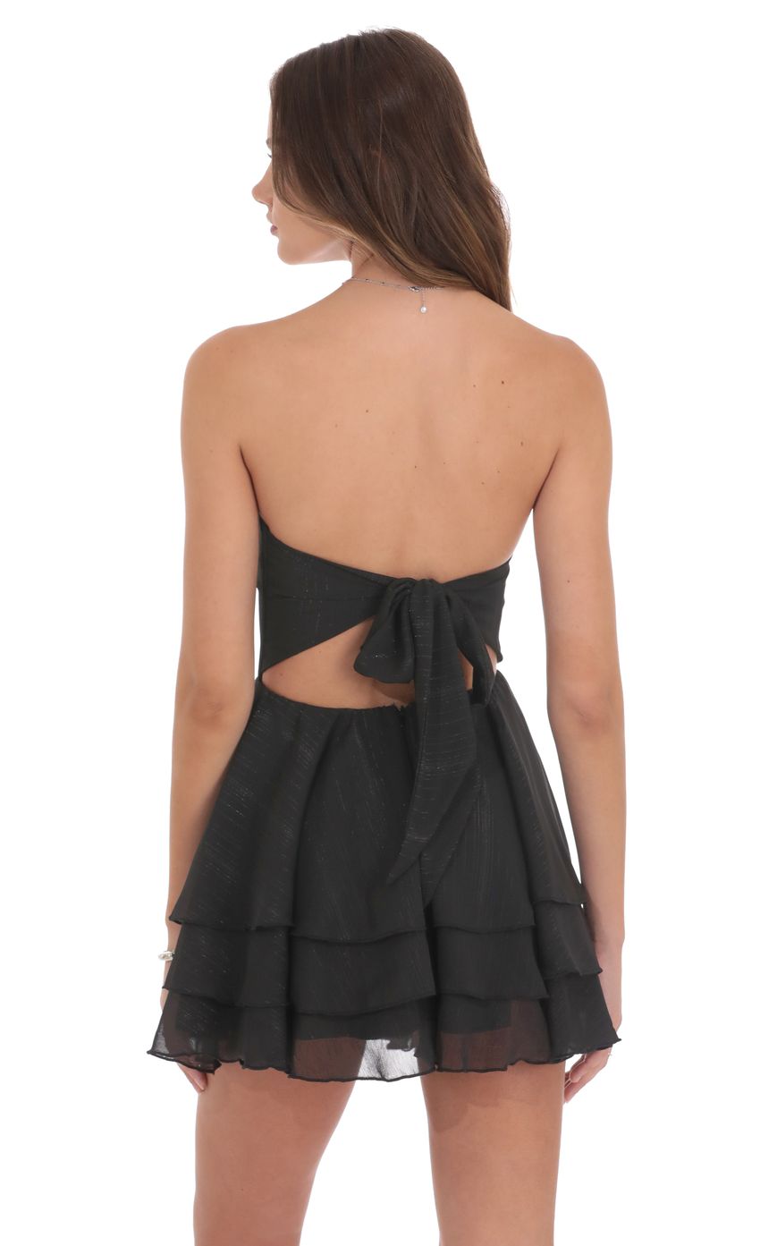 Picture Shimmer Striped Asymmetrical Dress in Black. Source: https://media-img.lucyinthesky.com/data/product-media/850xAUTO/ae4df282-635b-4138-9551-8e193d15aa43.jpg