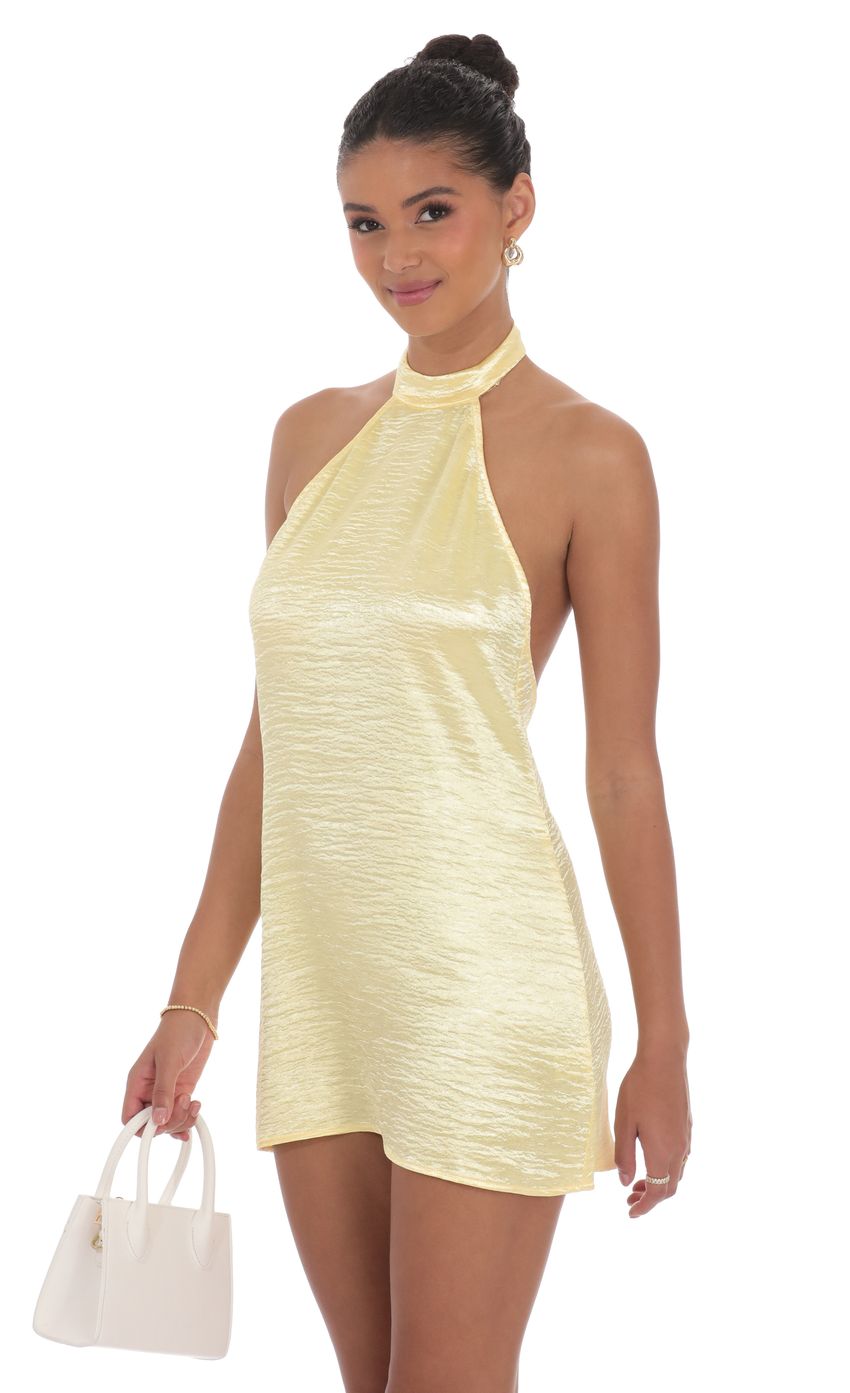 Picture Satin Halter Shift Dress in Yellow. Source: https://media-img.lucyinthesky.com/data/product-media/850xAUTO/b164d009-69e3-4880-9ac8-54c947cfbf95.jpg