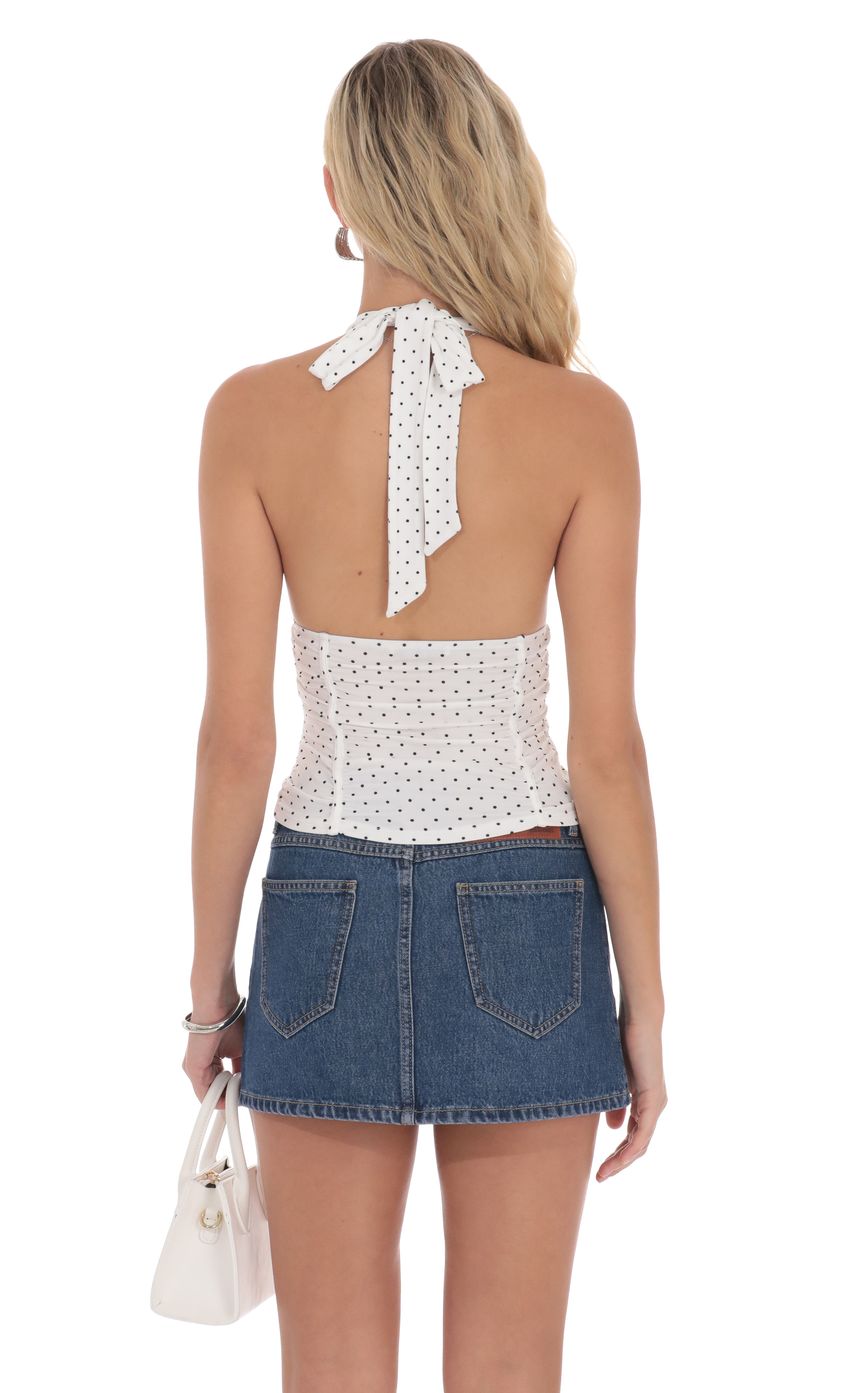 Picture Polka Dot Ruched Halter Top in White. Source: https://media-img.lucyinthesky.com/data/product-media/850xAUTO/b392a91b-2eb1-4d6d-947a-35333a2f55d5.jpg