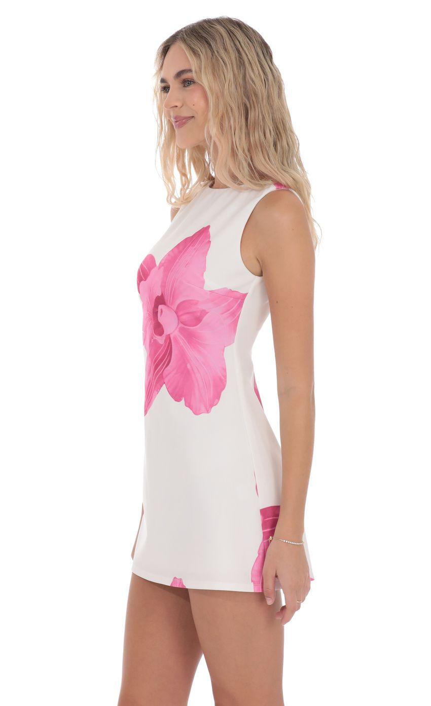 Picture Floral High Neck Dress in White. Source: https://media-img.lucyinthesky.com/data/product-media/850xAUTO/b7b0d8b2-2991-455d-8f62-651d55850487.jpg