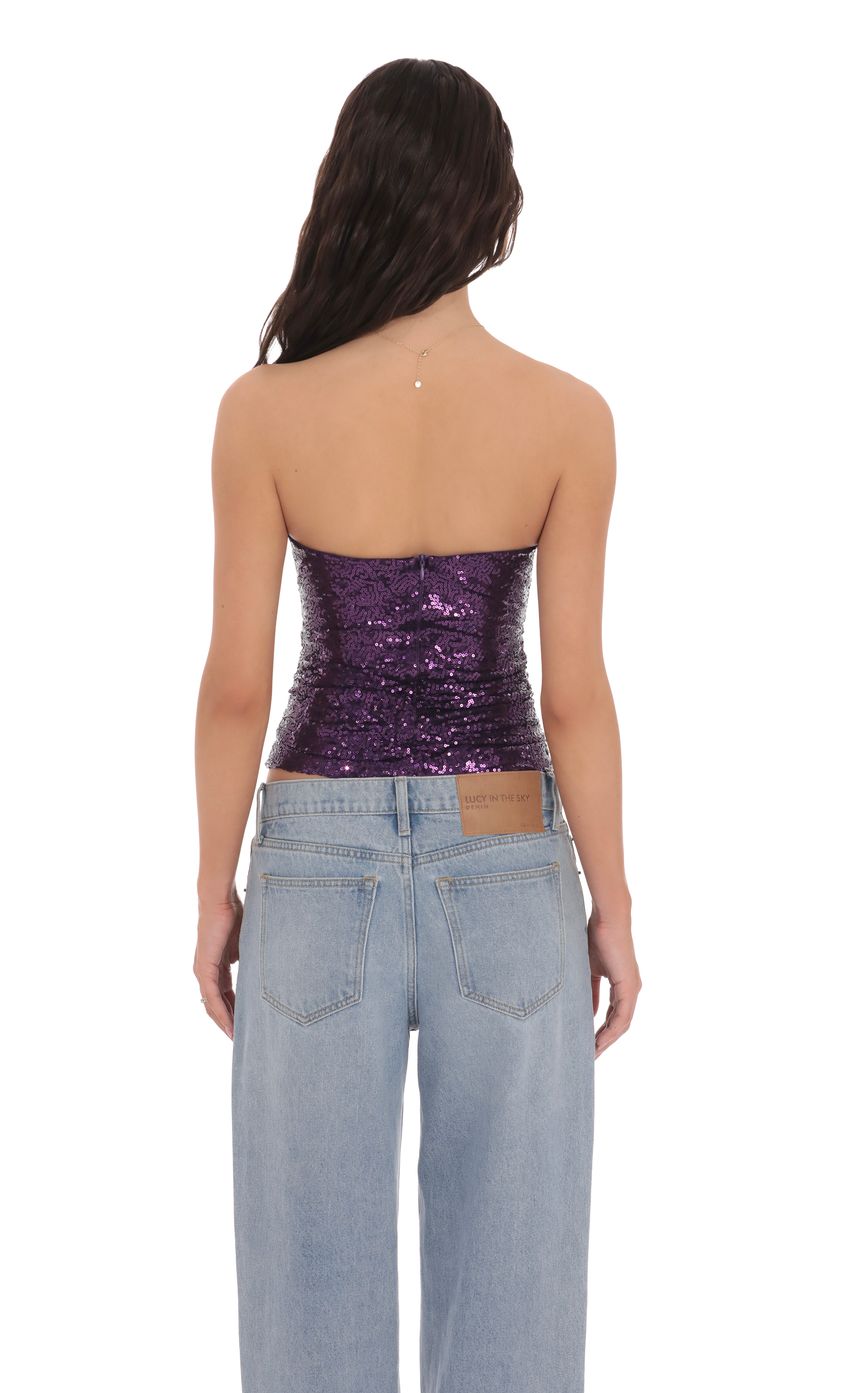 Picture Sequin Cutout Strapless Top in Purple. Source: https://media-img.lucyinthesky.com/data/product-media/850xAUTO/b8ecd28f-3cef-453f-b2bd-8e058b5fc133.jpg