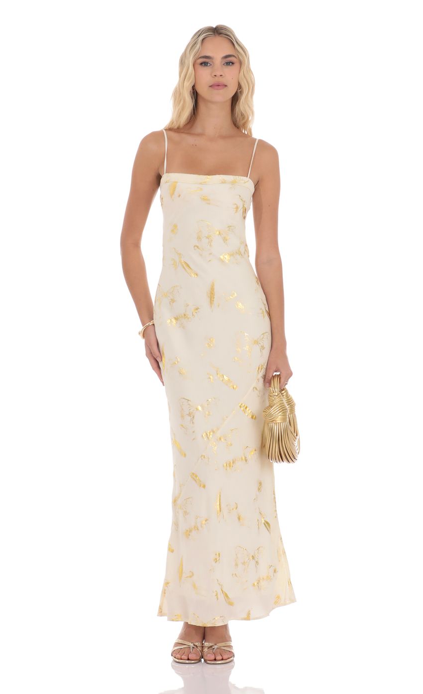 Picture Butterfly Foiled Open Back Maxi Dress in Cream. Source: https://media-img.lucyinthesky.com/data/product-media/850xAUTO/ba70fbd0-3c14-4f44-819e-9e5e7dad4cc2.jpg