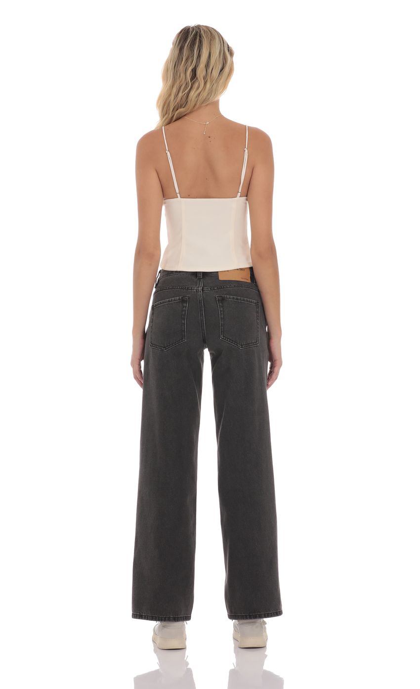 Picture Low Rise Cross Jeans in Black. Source: https://media-img.lucyinthesky.com/data/product-media/850xAUTO/bd46ab1f-c849-4187-9071-a4216c020241.jpg