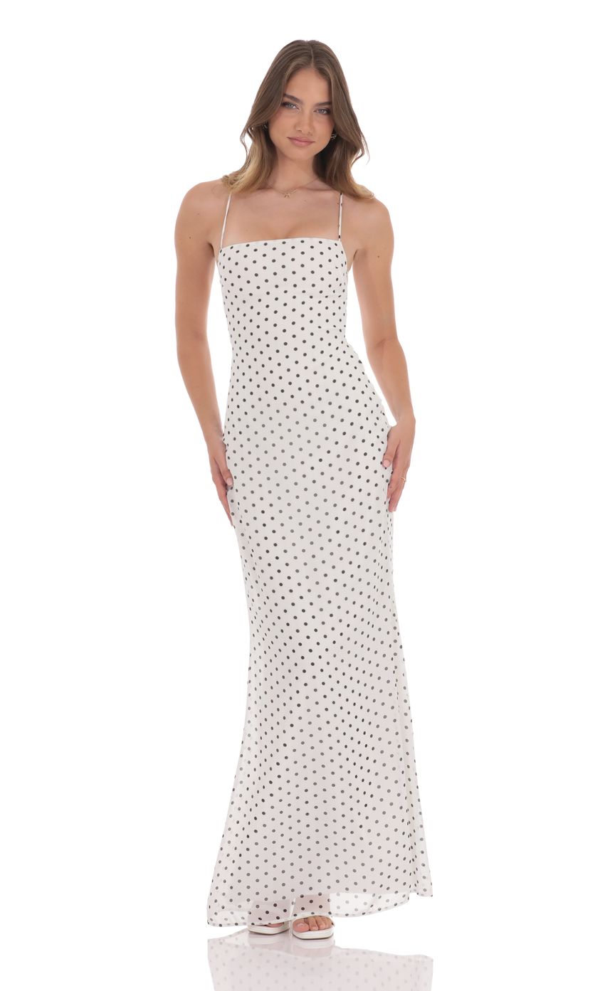 Picture Polka Dot Open Back Maxi Dress in White. Source: https://media-img.lucyinthesky.com/data/product-media/850xAUTO/bfb2bb7d-135a-44ee-be0e-83916b891c54.jpg