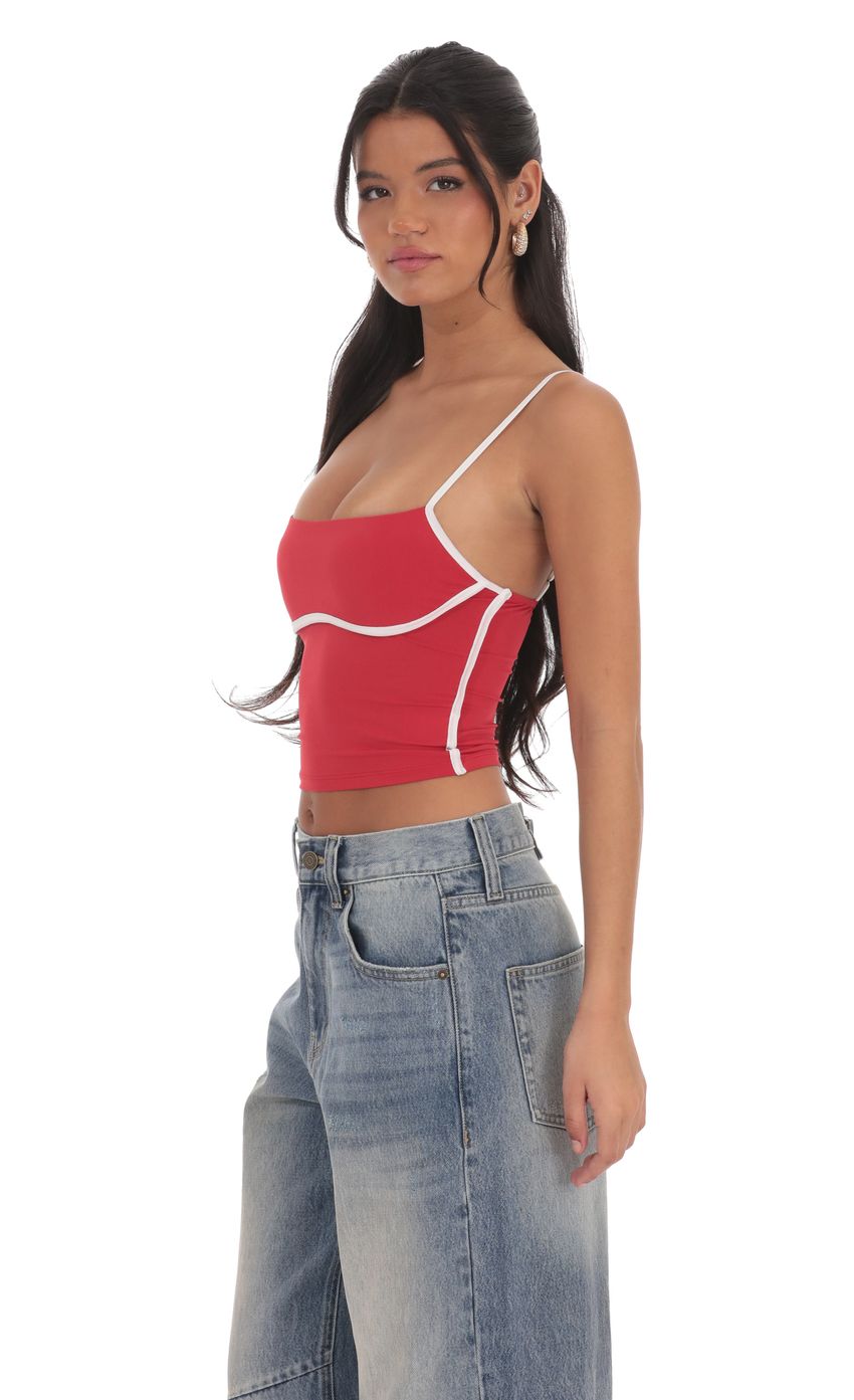 Picture Outline Crop Top in Sky Red. Source: https://media-img.lucyinthesky.com/data/product-media/850xAUTO/c4d43519-e65f-4650-b435-f8323e1c7fda.jpg