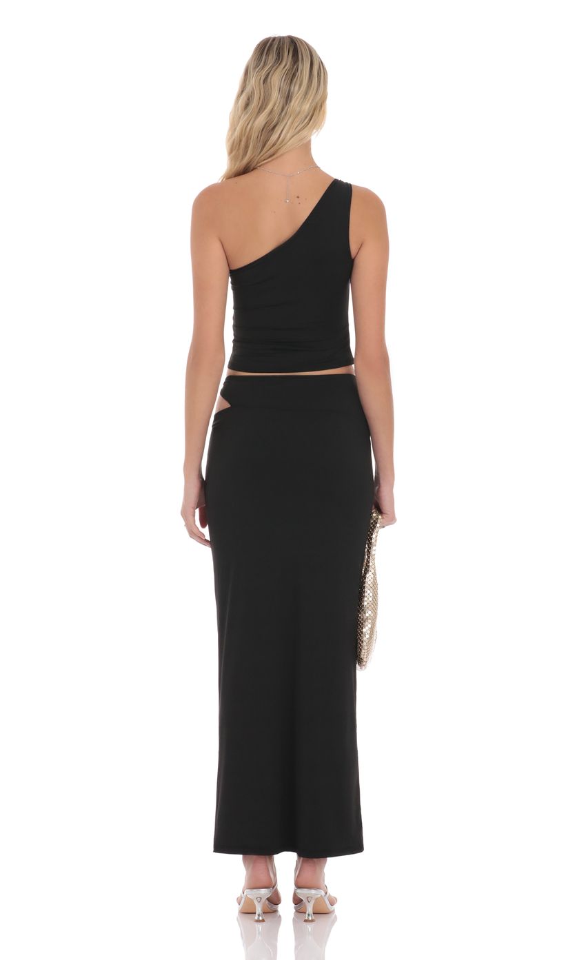 Picture Cutout Embellished Maxi Skirt in Black. Source: https://media-img.lucyinthesky.com/data/product-media/850xAUTO/c5d498c2-a8e5-4624-934f-8f57b8974598.jpg