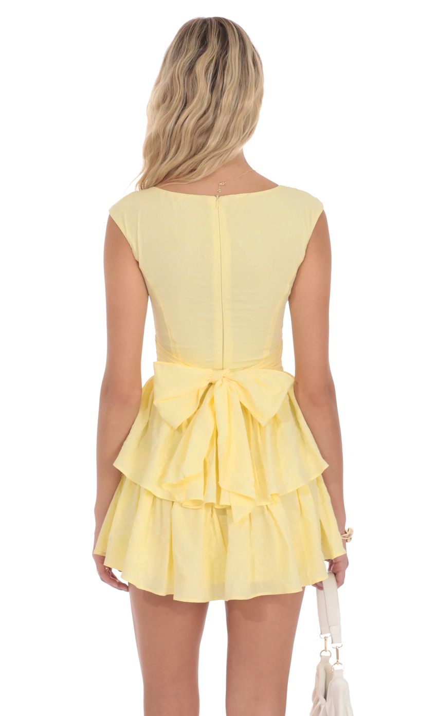 Picture Floral Jacquard Wide Strap Ruffle Dress in Yellow. Source: https://media-img.lucyinthesky.com/data/product-media/850xAUTO/c89b4d36-df9b-4957-b01b-f8b5e4f2a0cf.jpg
