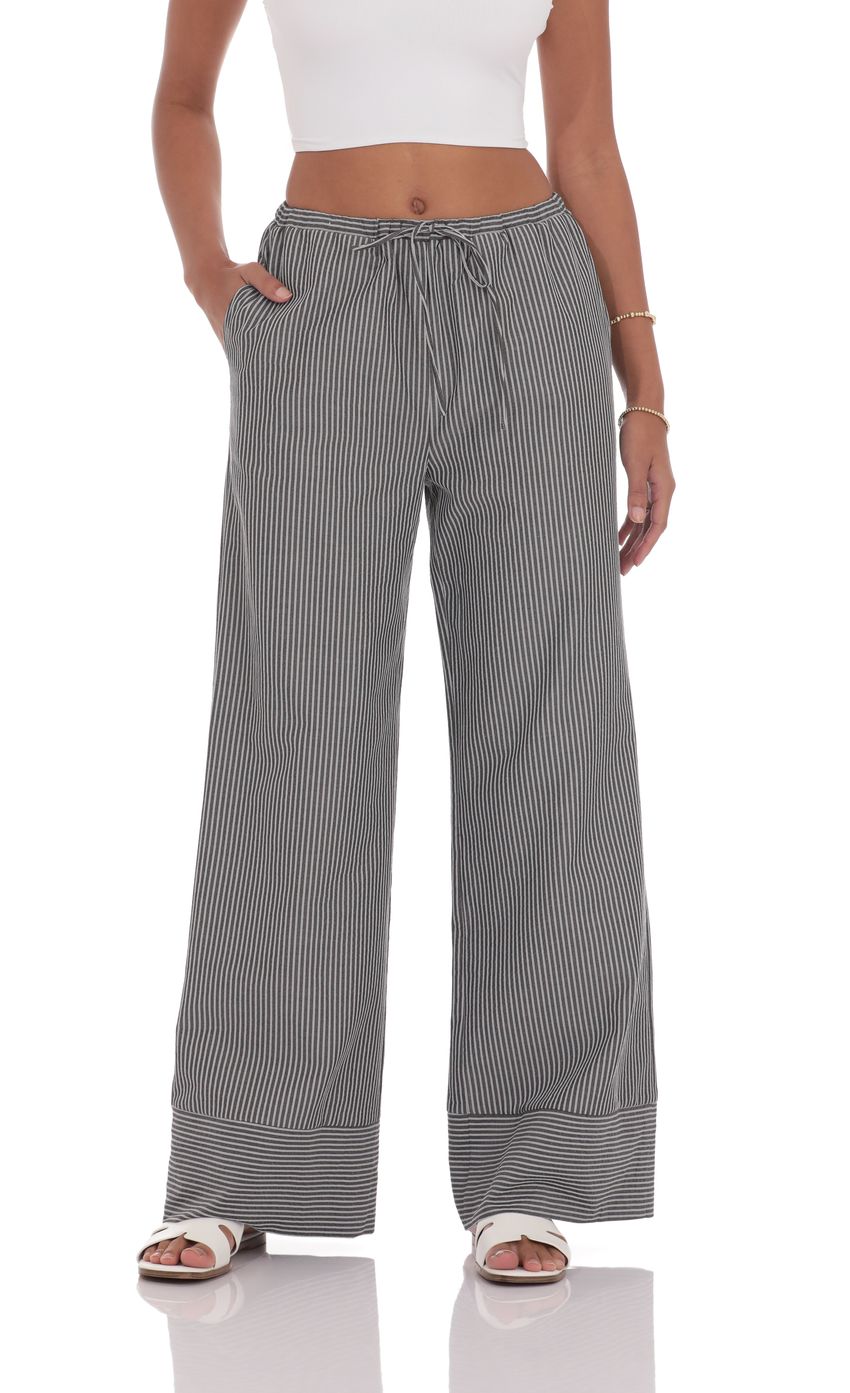 Picture Pinstripe Straight leg Pants in Grey. Source: https://media-img.lucyinthesky.com/data/product-media/850xAUTO/c9818557-1a4e-4f2f-999c-f30008182f95.jpg
