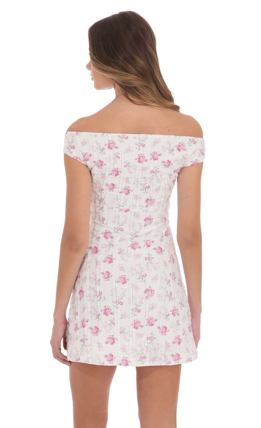 Picture Off Shoulder Lace Floral Dress in White. Source: https://media-img.lucyinthesky.com/data/product-media/850xAUTO/cac38703-06b2-43f3-b630-cbb32fd12421.jpg