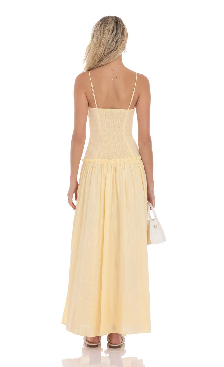 Picture Embroidered Striped Maxi Dress in Yellow. Source: https://media-img.lucyinthesky.com/data/product-media/850xAUTO/cb981db7-e951-4adf-a8f7-d08b528aa51e.jpg