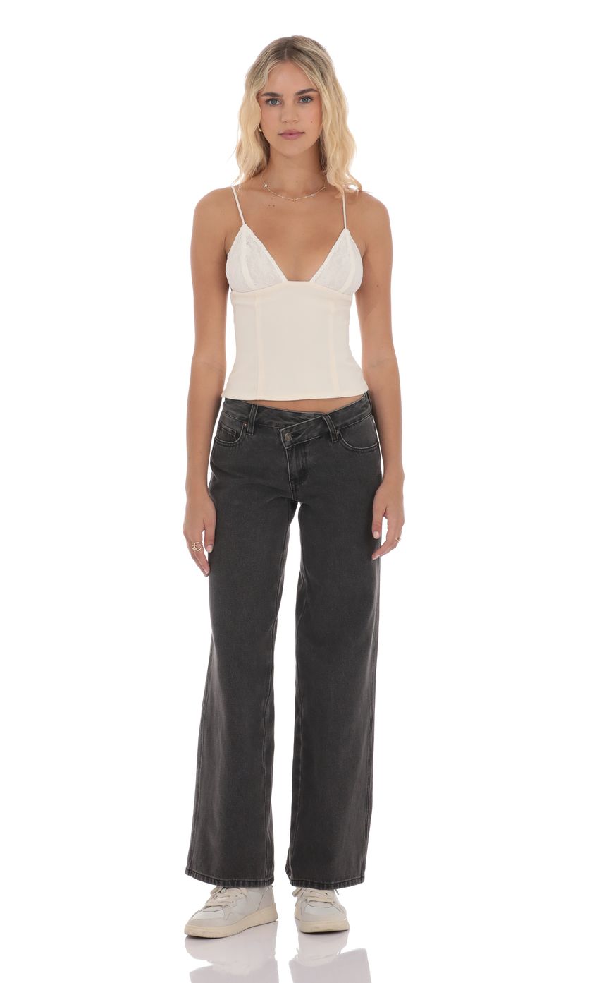 Picture Low Rise Cross Jeans in Black. Source: https://media-img.lucyinthesky.com/data/product-media/850xAUTO/cee31e4c-2aaf-4c78-8978-b7dbcc58bcdc.jpg