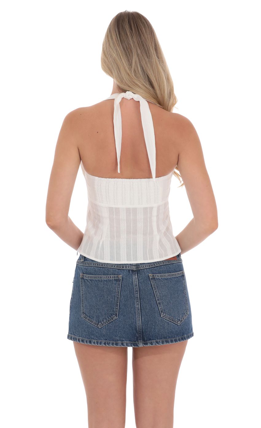 Picture Halter Textured Top In White. Source: https://media-img.lucyinthesky.com/data/product-media/850xAUTO/cf572799-3078-48ae-beb9-4a2d4210de45.jpg