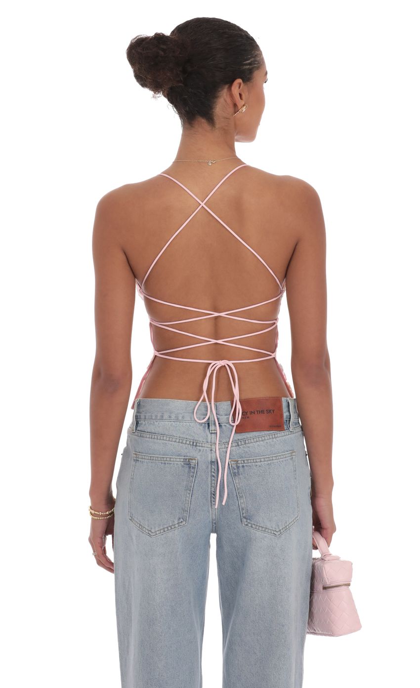 Picture Open Back Sequin Floral Top in Pink. Source: https://media-img.lucyinthesky.com/data/product-media/850xAUTO/d10e9a64-fa46-49c5-821c-7c777de68c7e.jpg