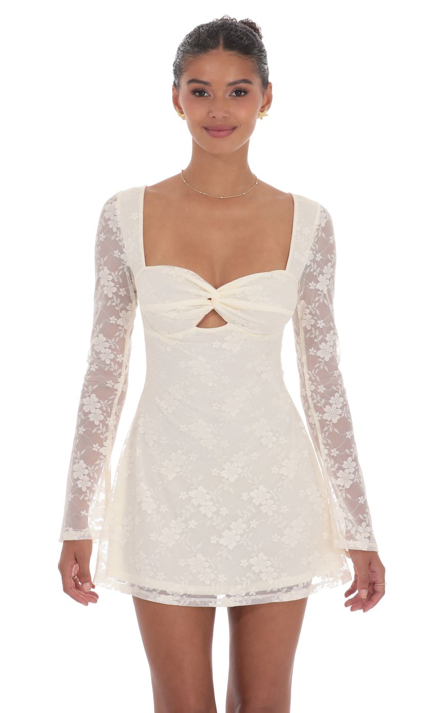 Picture Lace Twist Cutout Dress in Cream. Source: https://media-img.lucyinthesky.com/data/product-media/850xAUTO/d2a6ca1e-2ace-4737-9c3a-e06a35da6463.jpg