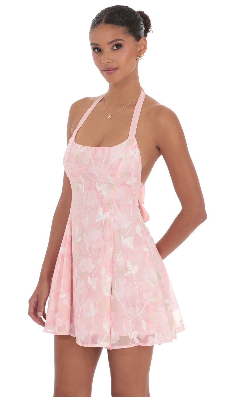 Picture Floral Halter Open Back Dress in Pink. Source: https://media-img.lucyinthesky.com/data/product-media/850xAUTO/d3c7de8e-ca3c-4379-9324-6cc7cad4ac27.jpg