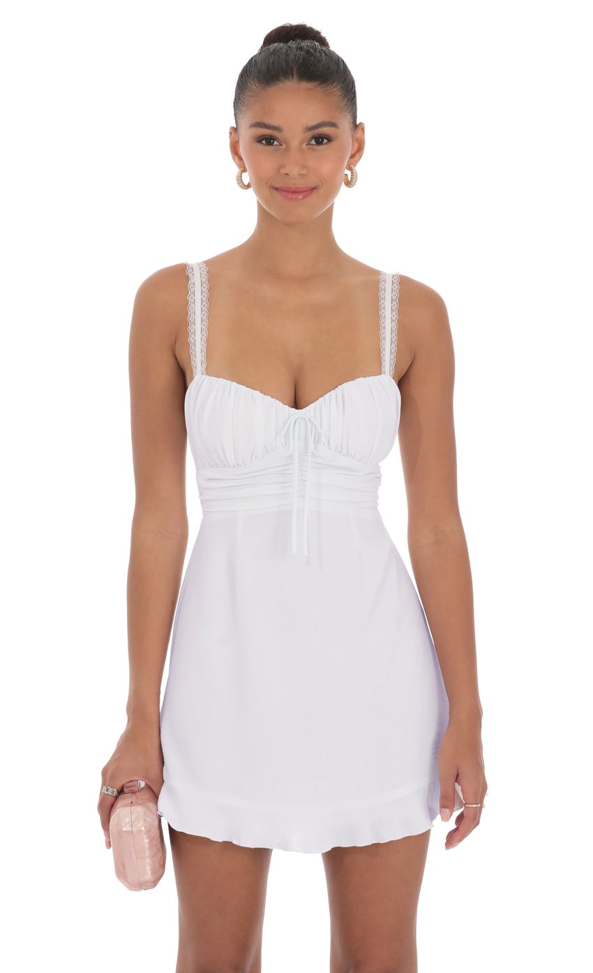 Picture Lace Strap Open Back Dress in Off White. Source: https://media-img.lucyinthesky.com/data/product-media/850xAUTO/d57f99f7-aa11-4748-9bea-ed8de5efad23.jpg