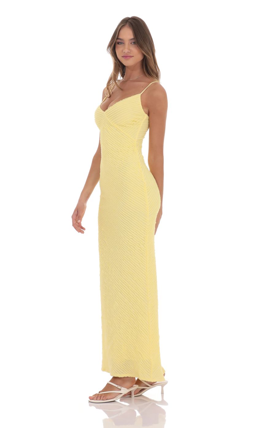 Picture Mini Ruffle V-Neck Maxi Dress in Yellow. Source: https://media-img.lucyinthesky.com/data/product-media/850xAUTO/d7490600-0810-4806-8ae0-8a97d03d6666.jpg