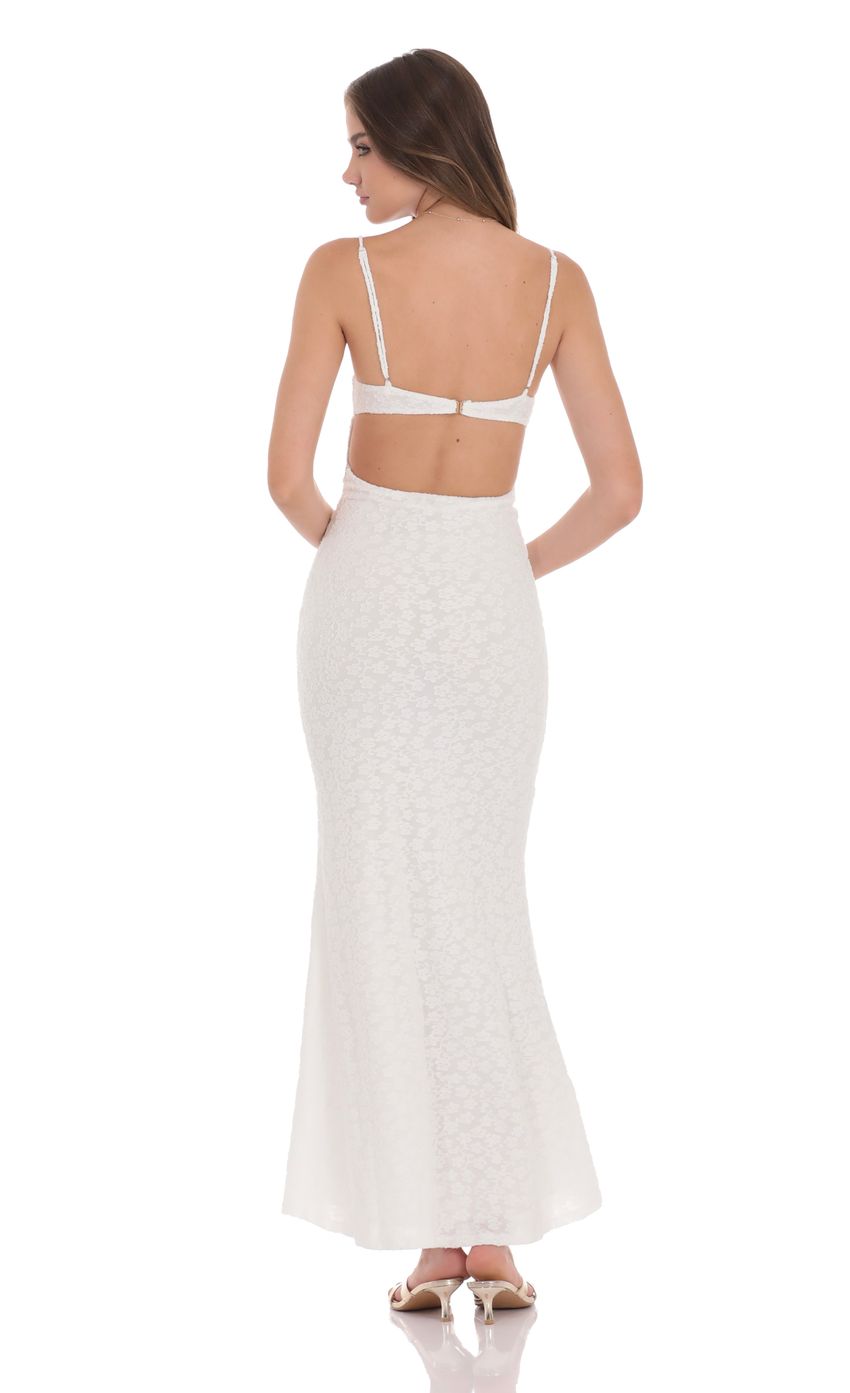 Picture Textured Floral Maxi Dress in White. Source: https://media-img.lucyinthesky.com/data/product-media/850xAUTO/dbcac6c6-1ae6-4662-ad25-82dc59301dc8.jpg