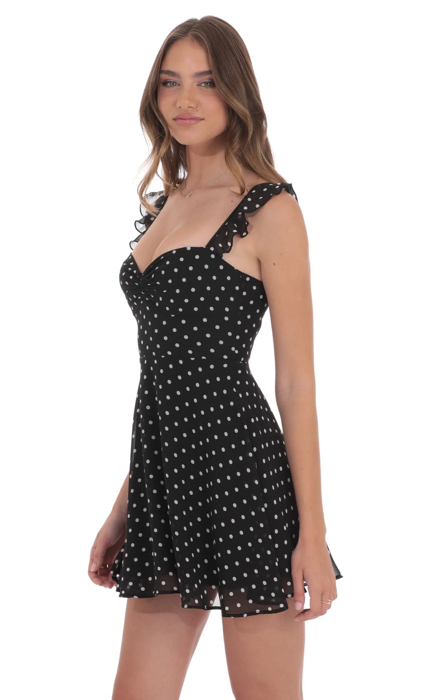 Picture Polka Dot Ruffle Strap A-Line Dress in Black. Source: https://media-img.lucyinthesky.com/data/product-media/850xAUTO/e066b424-66b3-4206-bf35-a837579ec6b4.jpg