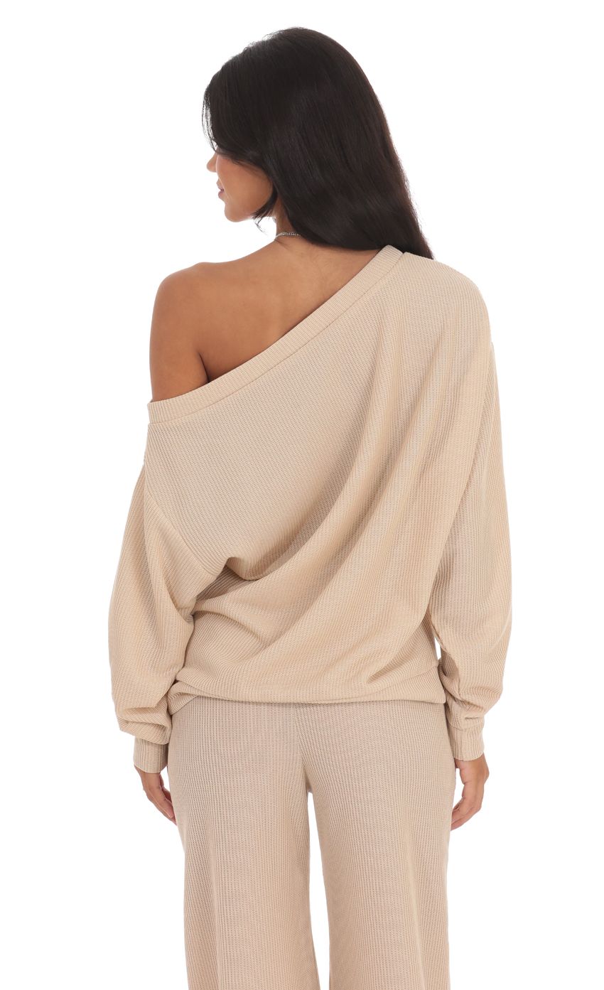 Picture Off Shoulder Knit Oversized Jumper in Beige. Source: https://media-img.lucyinthesky.com/data/product-media/850xAUTO/e353074e-a2a4-40f6-810d-3c03d8afd37a.jpg