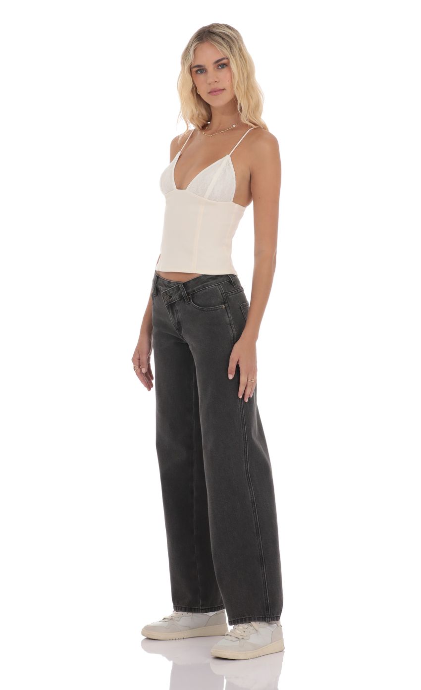 Picture Low Rise Cross Jeans in Black. Source: https://media-img.lucyinthesky.com/data/product-media/850xAUTO/e3ae86f1-da3f-4435-883c-bac891e278c0.jpg