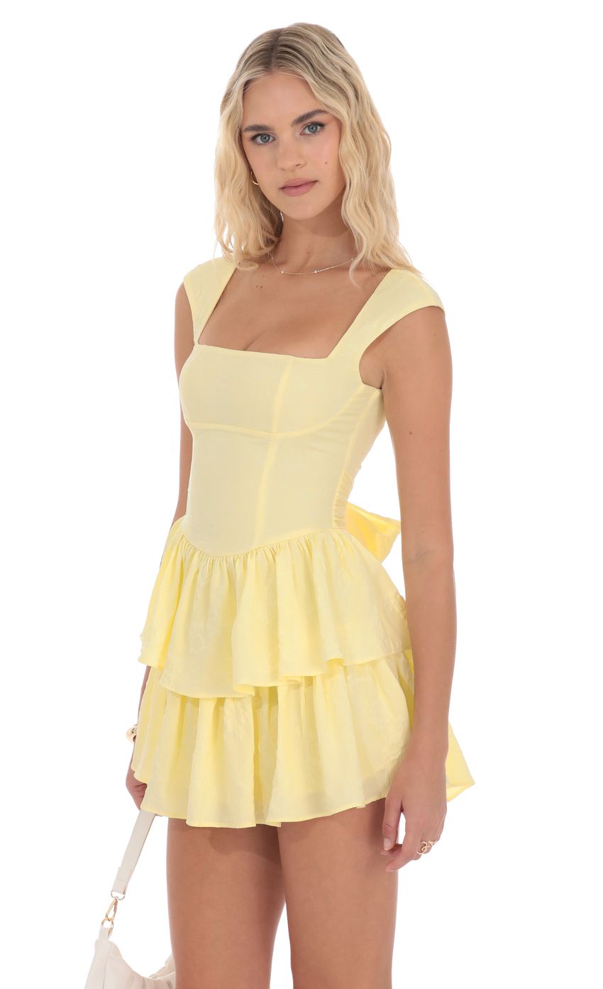 Picture Floral Jacquard Wide Strap Ruffle Dress in Yellow. Source: https://media-img.lucyinthesky.com/data/product-media/850xAUTO/edad1c91-abfd-440e-ab37-50a371c35afc.jpg