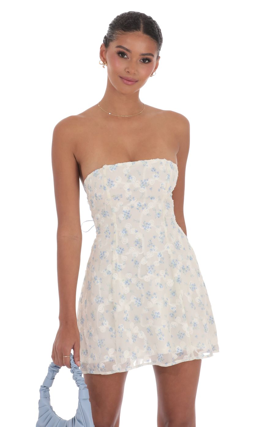 Picture Floral Strapless Fit and Flare Dress in White. Source: https://media-img.lucyinthesky.com/data/product-media/850xAUTO/eee3b3a7-b7c7-447a-84fb-df741e282a0f.jpg