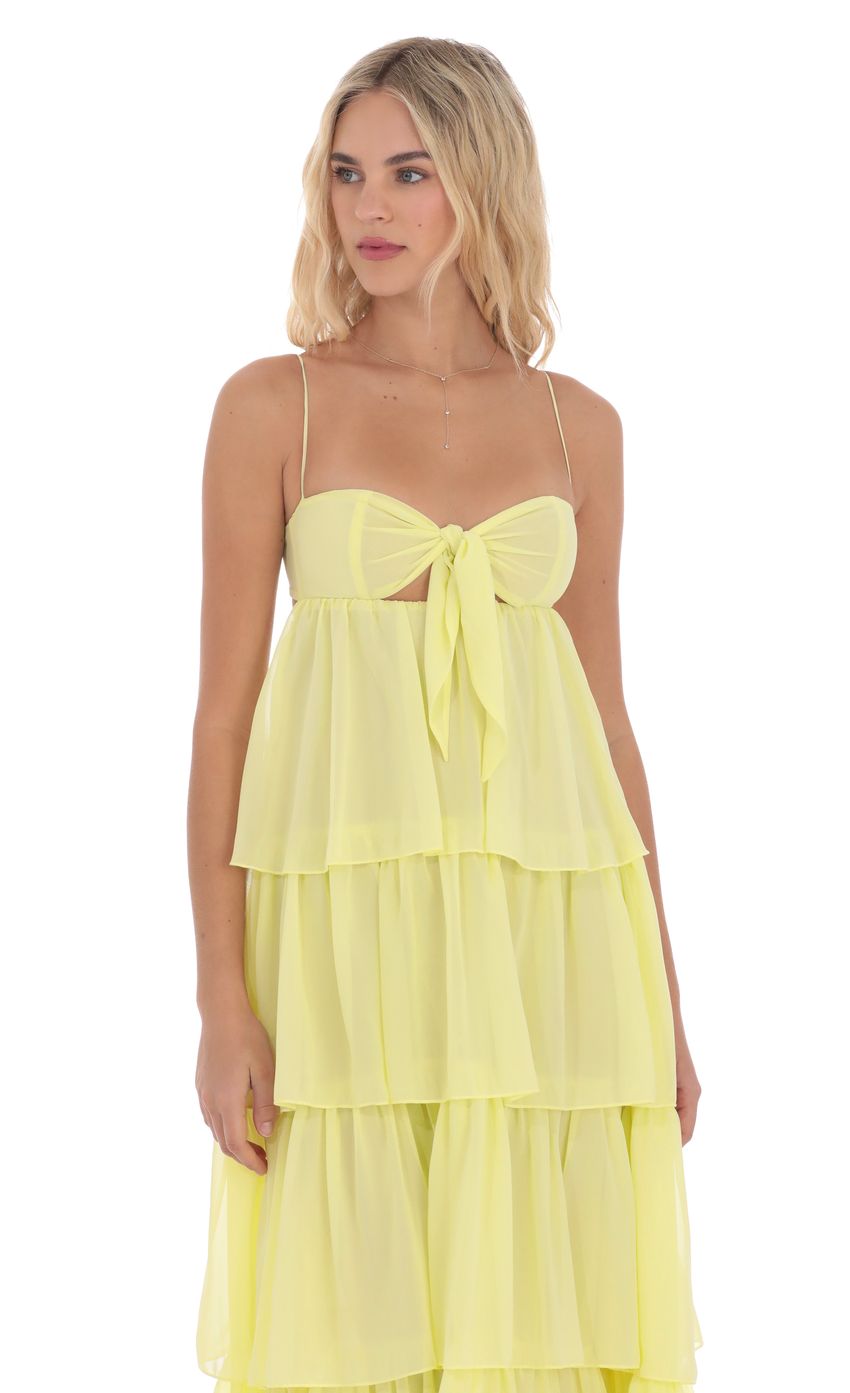 Picture Ruffle Front Tie Maxi Dress in Yellow. Source: https://media-img.lucyinthesky.com/data/product-media/850xAUTO/f06216ce-82de-477f-91b7-e85fd6b95cdb.jpg