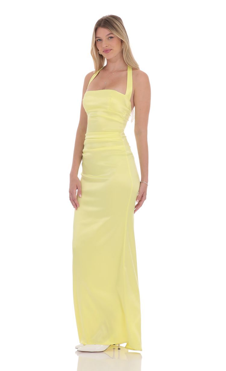Picture Satin Halter Maxi Dress in Yellow. Source: https://media-img.lucyinthesky.com/data/product-media/850xAUTO/f3f180f5-6200-407a-91e5-717edca2251c.jpg