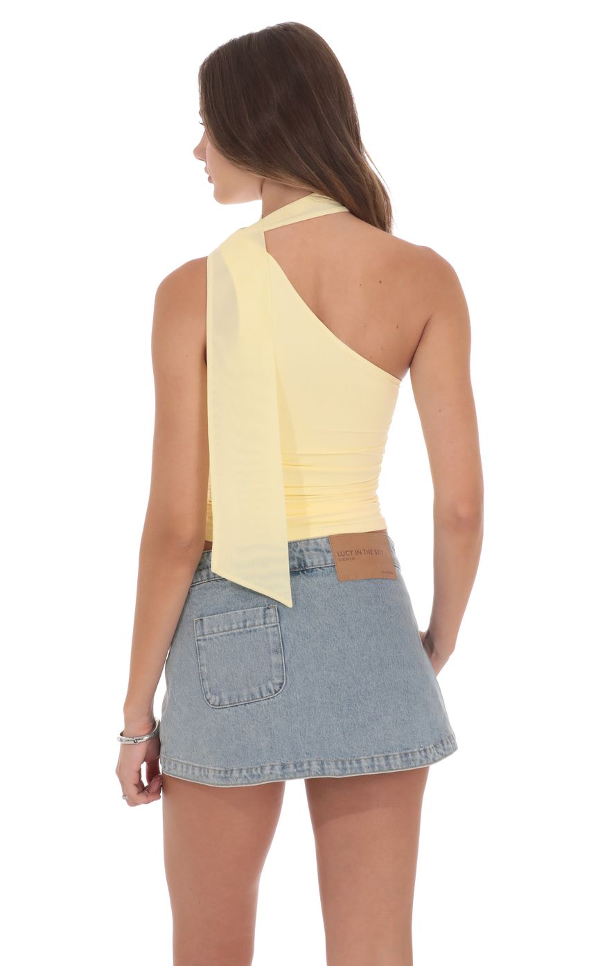 Picture Scarf Halter Top in Yellow. Source: https://media-img.lucyinthesky.com/data/product-media/850xAUTO/f7c96787-8446-49c1-8950-0652575cb14b.jpg