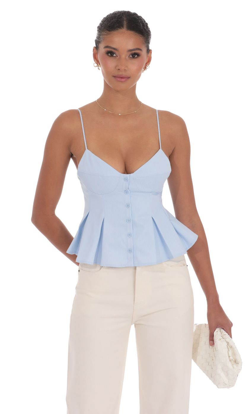 Picture Pinstripe Pleated Flare Top in Sky Blue. Source: https://media-img.lucyinthesky.com/data/product-media/850xAUTO/fc4ad2e4-0334-4ce7-a546-6f03728d6321.jpg