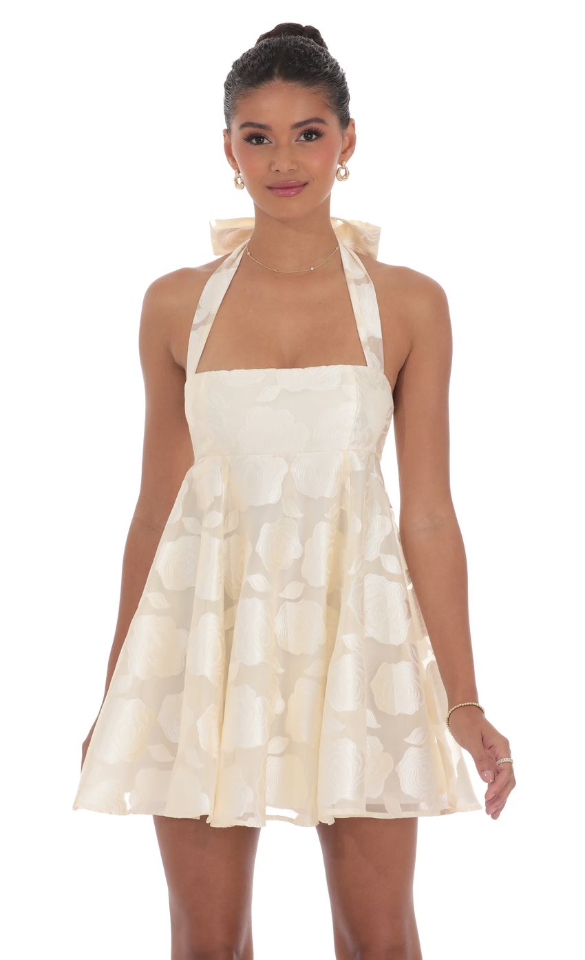 Picture Floral Flare Babydoll Dress in Cream. Source: https://media-img.lucyinthesky.com/data/product-media/850xAUTO/fee16c5f-19bb-4251-a005-9ed8bf47f7cc.jpg