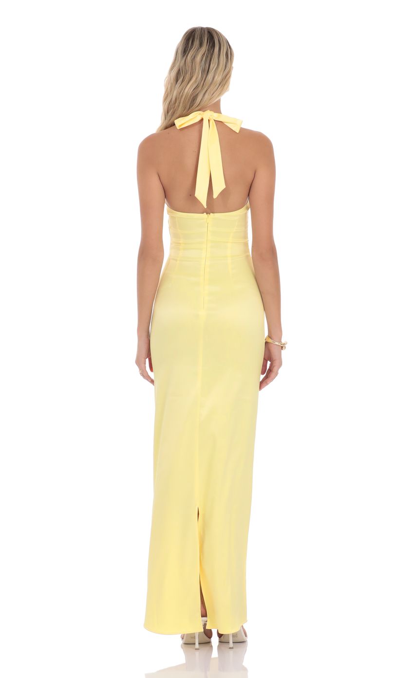 Picture Satin Halter Maxi Dress in Yellow. Source: https://media-img.lucyinthesky.com/data/product-media/850xAUTO/ff0c757a-6e42-43e9-934e-924d579197ce.jpg
