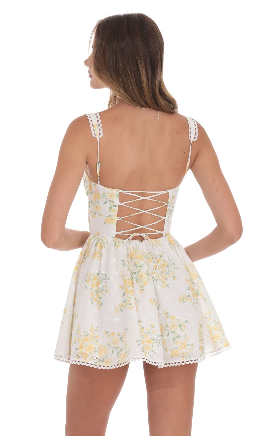 Picture Corset Floral Fit and Flare Dress in White. Source: https://media-img.lucyinthesky.com/data/product-media/850xAUTO/fff09487-6c8c-4566-92ca-f7ed183f498d.jpg